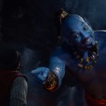 Aladdin (Mena Massoud) meets the larger-than-life blue Genie (Will Smith) in Disney’s live-action adaptation ALADDIN, directed by Guy Ritchie. Courtesy Walt Disney Studios