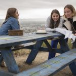 Actors Kaitlyn Dever and Beanie Feldstein with director Olivia Wilde on the set of her directorial debut, BOOKSMART, an Annapurna Pictures release. Credit: Francois Duhamel / Annapurna Pictures