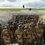 Cast and crew members on the set of 1917, the new epic from Oscar®-winning filmmaker Sam Mendes. Courtesy Universal Pictures.