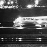 A hijacked Northwest Airlines jetliner 727 sits on a runway for refueling at Tacoma International Airport, Nov. 25, 1971, Seattle, Wash. (AP Photo)