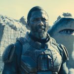 Caption: (L-r) IDRIS ELBA as Bloodsport and KING SHARK in Warner Bros. Pictures’ superhero action adventure “THE SUICIDE SQUAD,” a Warner Bros. Pictures release. Photo Credit: Warner Bros. Pictures/™ & © DC Comics