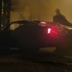 Caption: ROBERT PATTINSON as Batman with the Batmobile in a scene in Warner Bros. Pictures’ action adventure “THE BATMAN,” a Warner Bros. Pictures release. Photo Credit: Warner Bros. Pictures/ ™ & © DC Comics