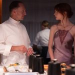 Ralph Fiennes and Anya Taylor-Joy in the film THE MENU. Photo by Eric Zachanowich. Courtesy of Searchlight Pictures. © 2022 20th Century Studios All Rights Reserved